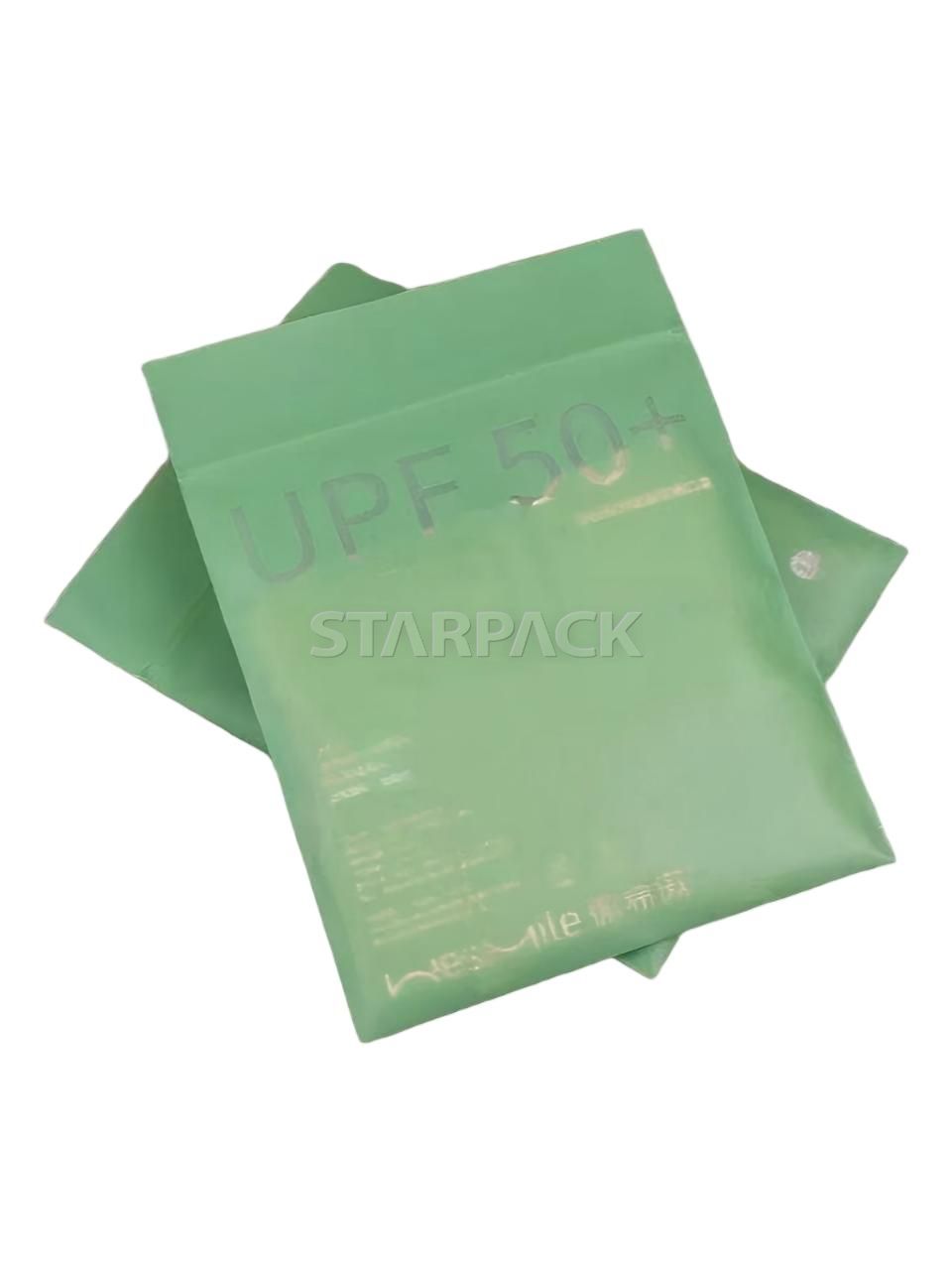 Side angle shot of eco matte green plastic bone zip lock bag with smile graphic for snack packing
