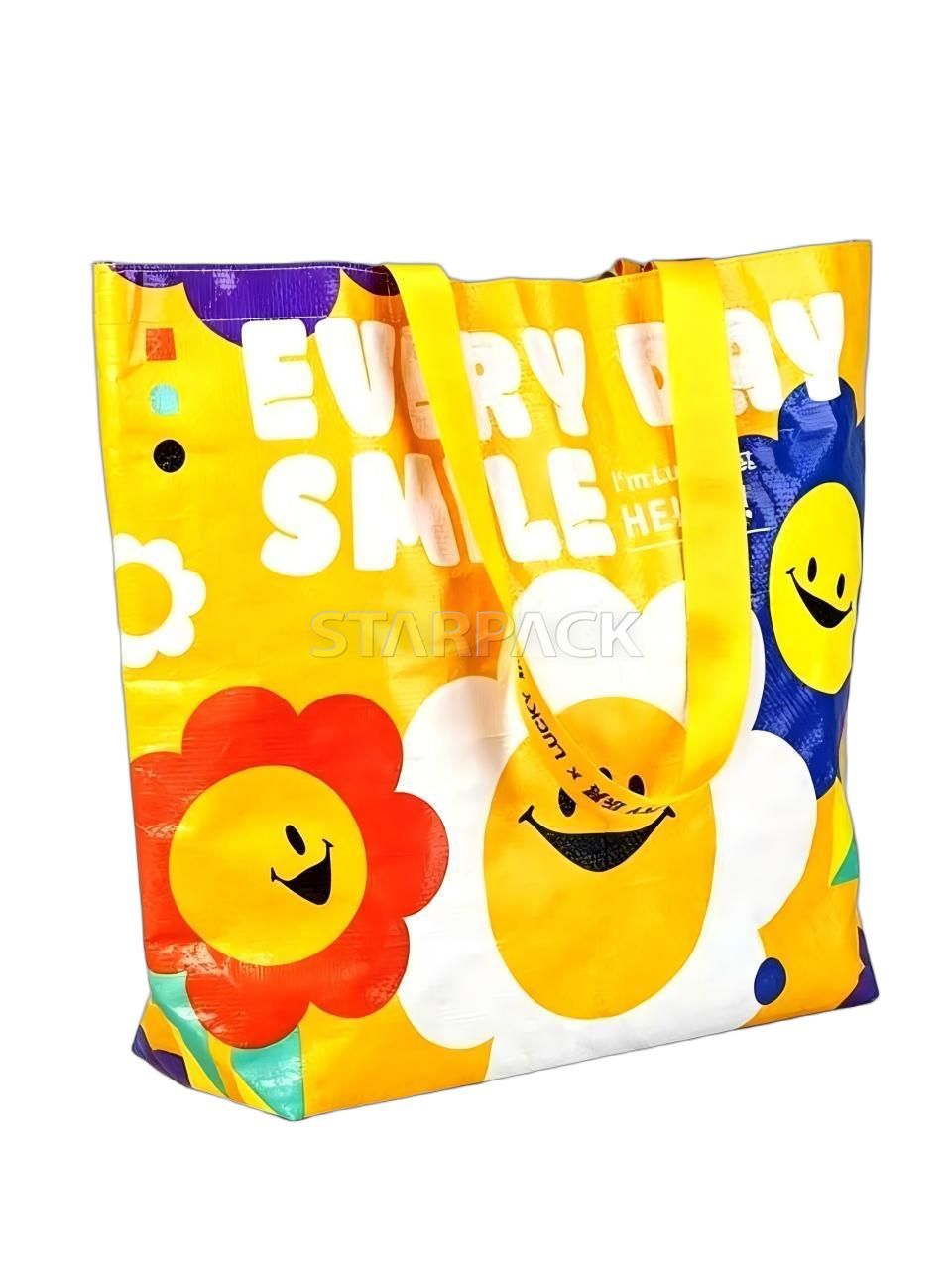 Side angle display of eco friendly everyday smile printed woven shopping bag for grocery and daily carry