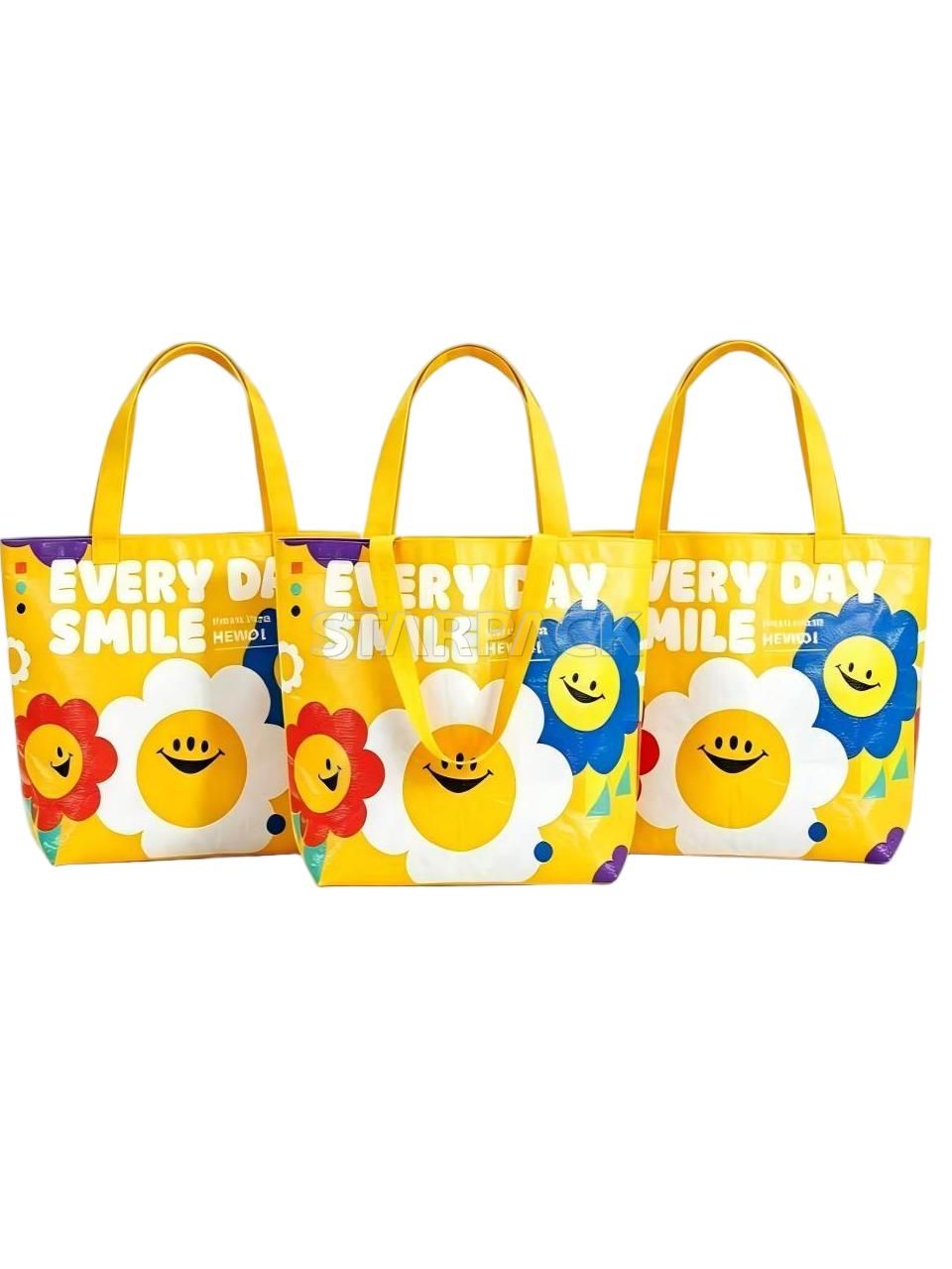 Three yellow flower smile pattern PP woven grocery tote bags, reusable eco shopping handbags for supermarket daily use