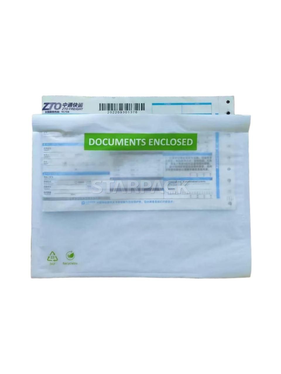 Front flat display compostable white paper invoice enclosed self-adhesive bag, real shipping waybill inserted inside for visual reference, green eco label printed, plastic-free document holder for carton logistics packaging